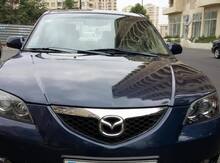 Mazda 3, 2009 год