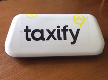 Taxify emblemi