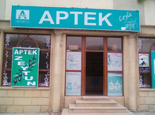 "Aptek" reklam tablosu