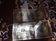 1 dollar əsginası