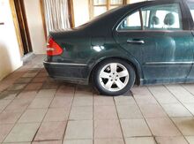 "Mercedes E211" arxa yaylar