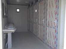 Sanitar qovşaqlı modul konteyner binası