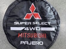 "Mitsubishi Pajero İO" ehtiyat təkər üzlüyü