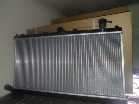 "BYD F3" su radiatoru
