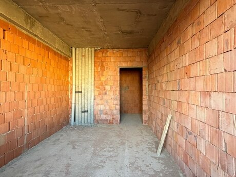 Qurtuluş 93 kompleksində 1 otaqlı yeni tikili mənzil satılır, 35 m², 55 000 AZN, şəkil 2 / 5