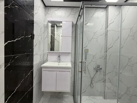 Qurtuluş 93 kompleksində 3 otaqlı yeni tikili mənzil satılır, 54 m², 84 000 AZN, şəkil 3 / 10