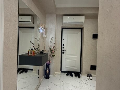 Qurtuluş 93 kompleksində 2 otaqlı yeni tikili mənzil satılır, 69 m², 99 000 AZN, şəkil 4 / 12