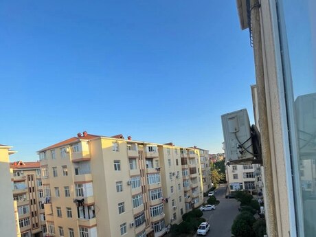 1 otaq · 56 m²