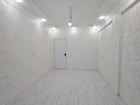 Qurtuluş 93 kompleksində 2 otaqlı yeni tikili mənzil satılır, 57 m², 67 500 AZN, şəkil 2 / 7