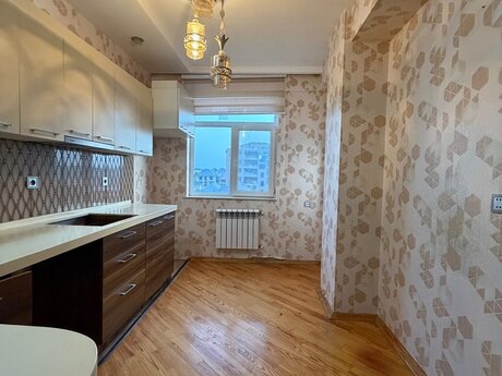 Qurtuluş 93 kompleksində 2 otaqlı yeni tikili mənzil satılır, 75 m², 85 500 AZN, şəkil 2 / 10