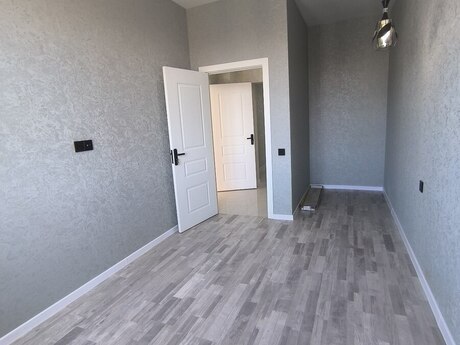 2-room new-build apartment for sale in Qurtuluş 93 residence, 58 m², 74 000 AZN, photo 2 / 12