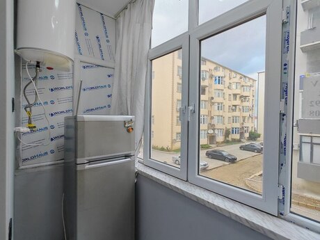 Qurtuluş 93 kompleksində 2 otaqlı yeni tikili mənzil kirayə verilir, 55 m², 450 AZN/ay, şəkil 2 / 12