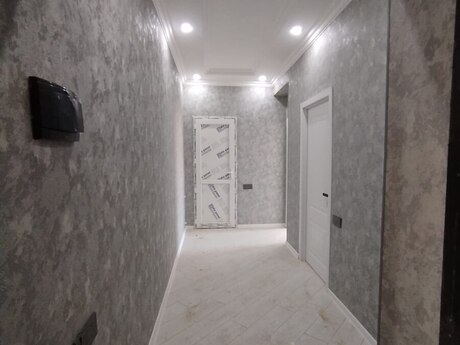2-room new-build apartment for sale in Qurtuluş 93 residence, 54 m², 66 000 AZN, photo 2 / 12