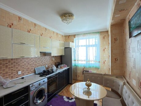 2-room new-build apartment for sale in Qurtuluş 93 residence, 75 m², 110 000 AZN, photo 2 / 10