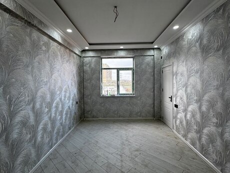 2-room new-build apartment for sale in Qurtuluş 93 residence, 54 m², 66 000 AZN, photo 2 / 11