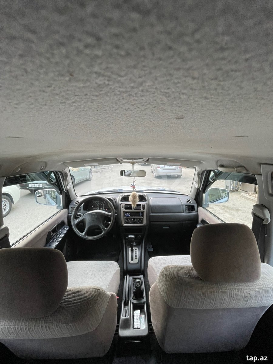 Mitsubishi Pajero io, 2002 год (7)