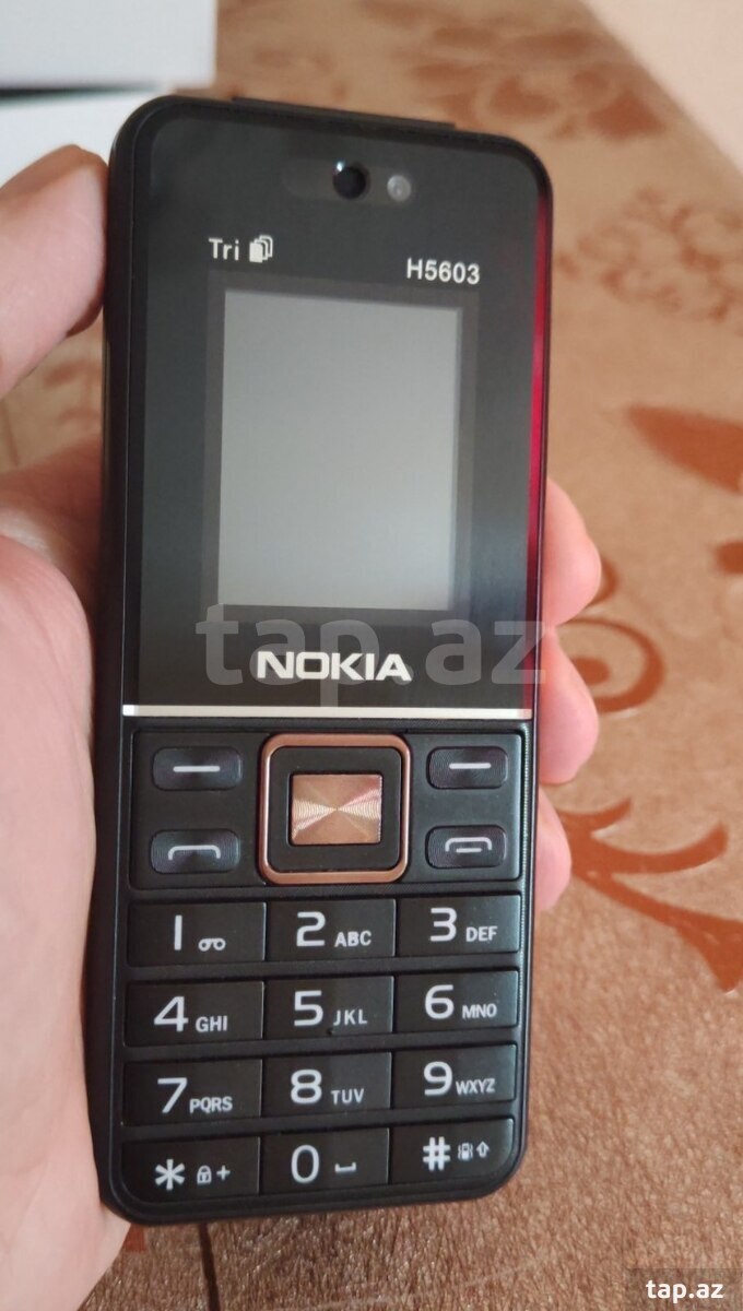 Telefon H5604 (2)