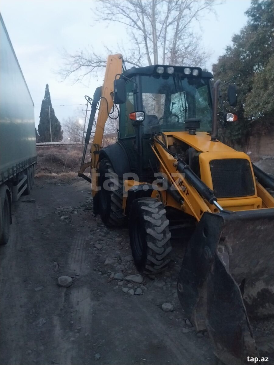 Tikinti yükləyici New Holland, 2013 il (3)