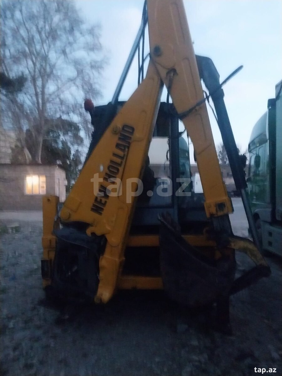 Tikinti yükləyici New Holland, 2013 il (4)