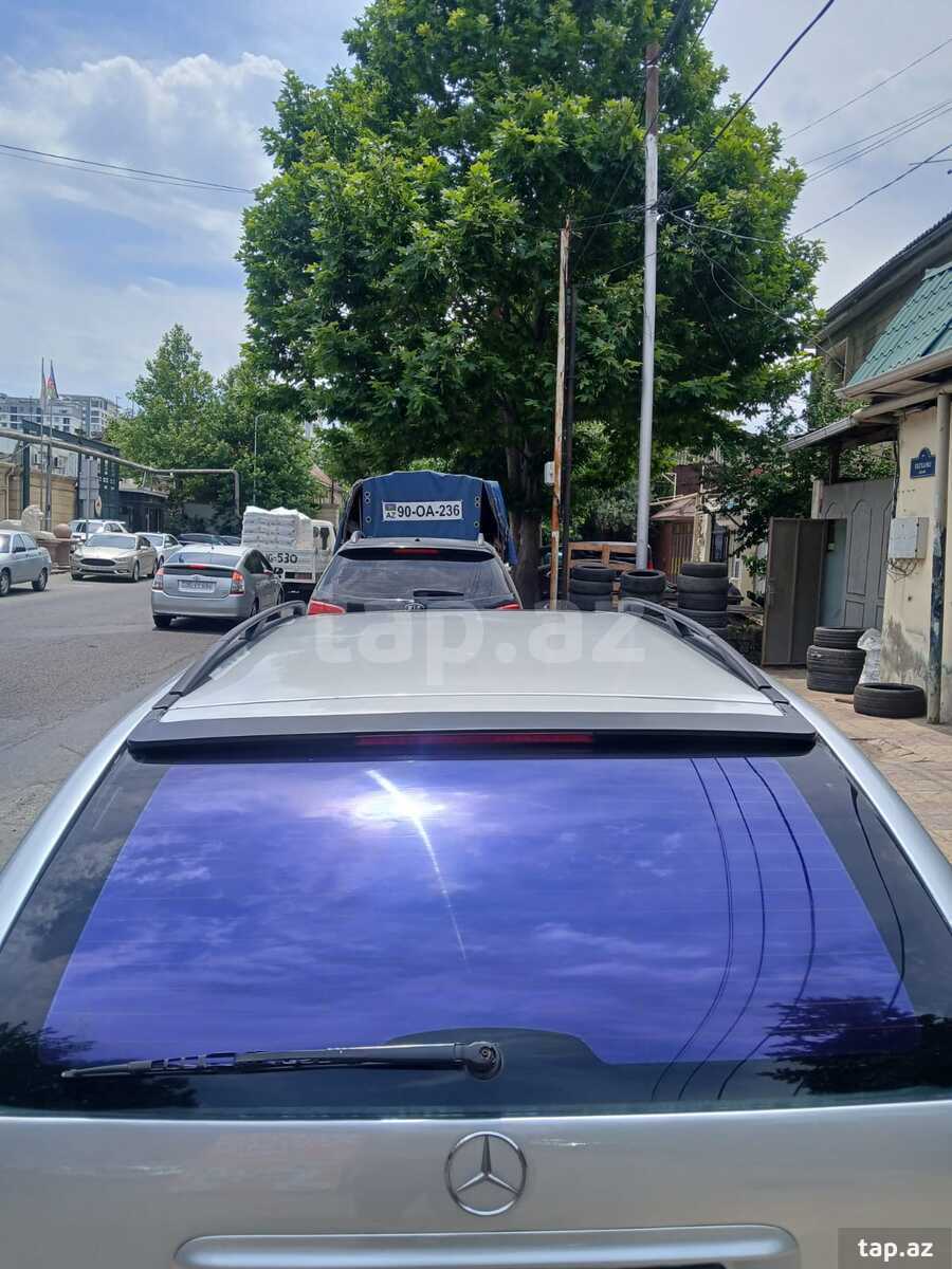 Mercedes 220 CE, 2000 il (10)