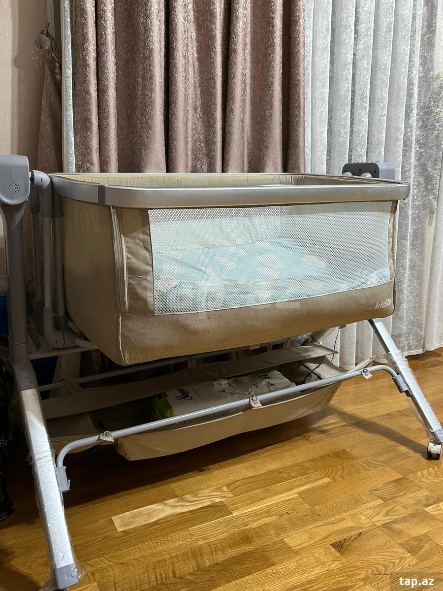 Kidilo elektrikli körpə beşiyi