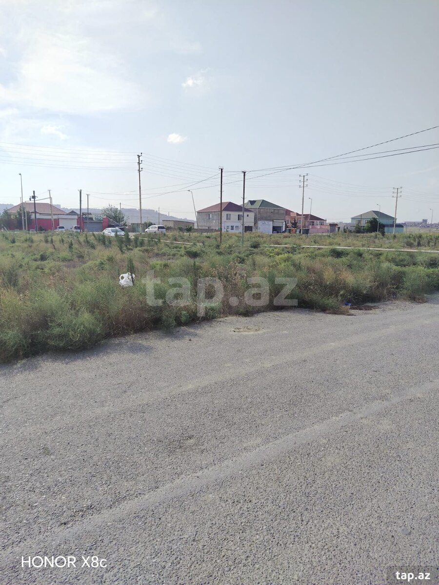 Torpaq satılır, Dədə Qorqud, Bakı