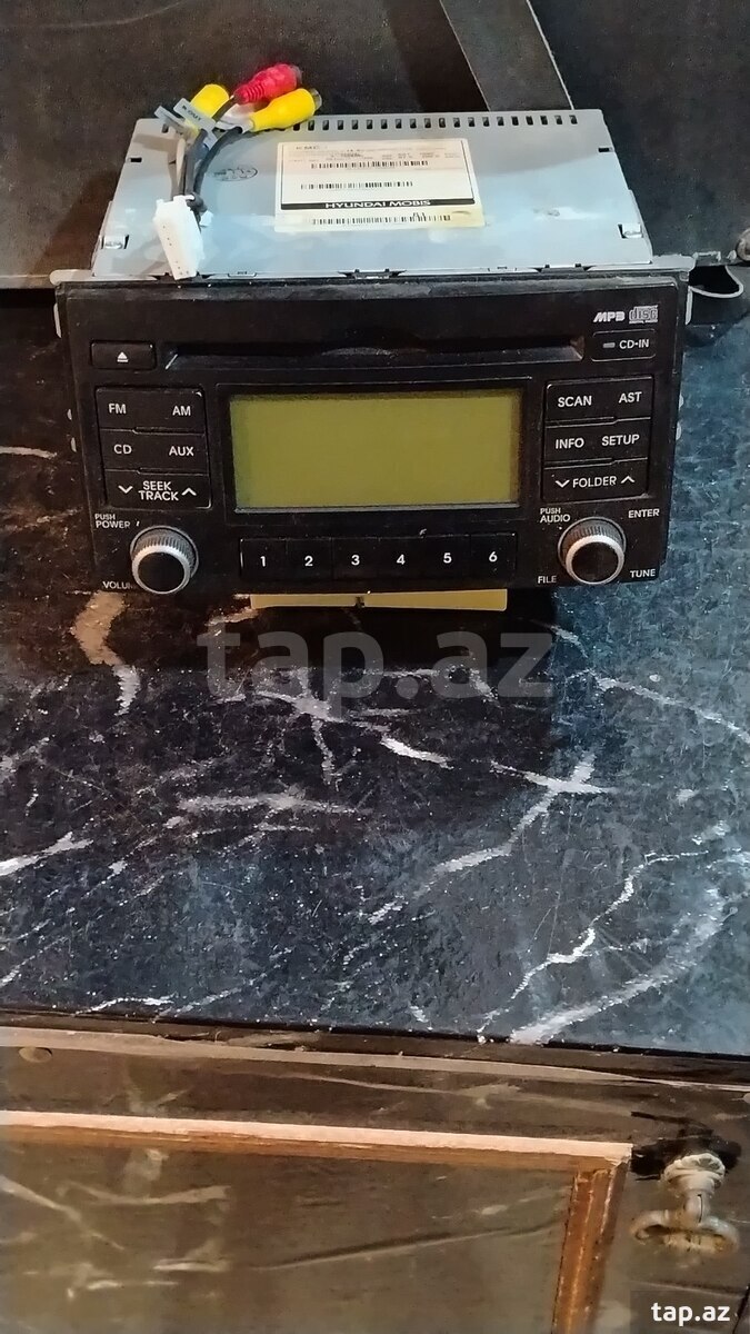 Kia Sportage maqnitolası
