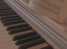 Piano və vokal muəllimi