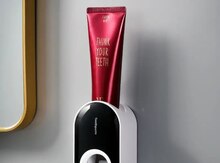Настенная автоматическая соковыжималка для зубной пасты и держатель зубной щетки.