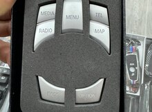"BMW" coystik düymələri