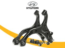 "Hyundai Santa Fe" alt asqı qolu