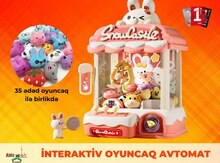 İnteraktiv oyuncaq avtomat