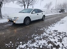 Mazda 323, 1998 il