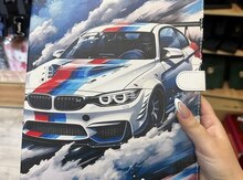 Planşet "Apple iPad" arxalığı "BMW"