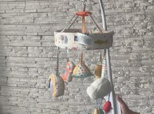 Beşik oyuncagı "Mothercare"