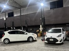 "Toyota Prius, Aqua" icarəsi