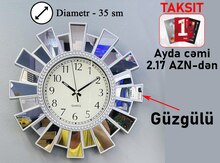 Divar saatı "Mirror Gold"