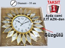 Divar saatı "Mirror Gold"