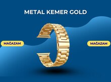 Qızılı metal kəmər