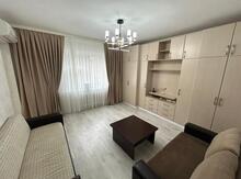2-otaqlı yeni tikili, İnşaatçılar pr., 69 m²